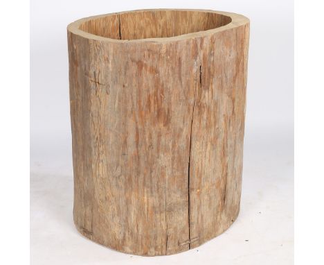 A large hollowed out tree trunk log basket, having a plank base, 86cm high.  CR*  woodworm, general marks and losses.