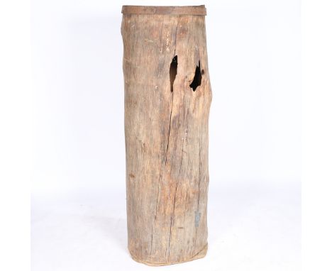 A large hollowed out tree trunk, 160cm high.  CR*  woodworm, general marks and losses.