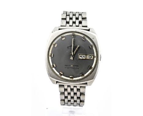 Vintage Mido watch, automatic, Multistar, datoday, with a square case with a round gray dial with a day and date. With link s