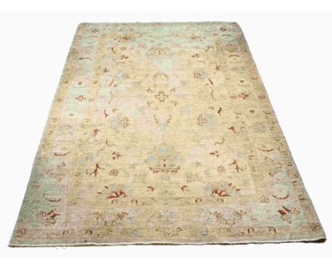 Old pastel-colored Syrian carpet with floral decor. Color: light blue, cream, pink. Dimensions: 250 x 168 cm. In good conditi