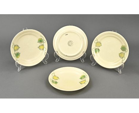 Four antique Ram Arnhem polychrome pottery plates with lantern plant decor. Circa 1920. Dimensions: Ø 17.3 cm. In good condit