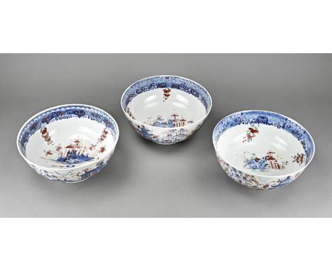 Three very large 18th century Chinese porcelain Imari cupboard bowls with landscape/pagoda decor. All three hairline. Dimensi