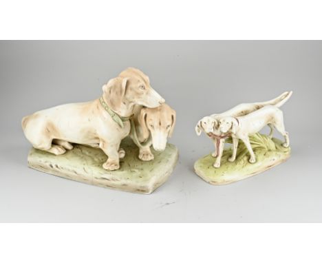Two large antique Bohemian figures made of earthenware. Numbered. Circa 1900. Two large dachshunds, hairline cracks. Hunting 
