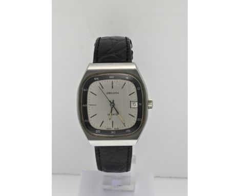 Vintage Zenith quartz watch, rectangular contoured steel case. With date indication. Glass somewhat scratched. Width 34mm. Eq