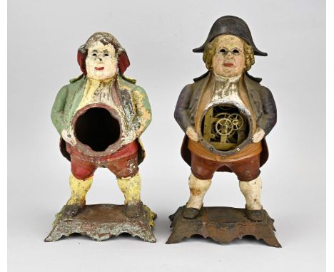 Two antique American Diecast clock cases with polychromy. Unrestored. First half 20th century. Size: 39 - 42 cm. In fair/good