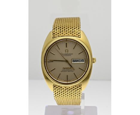 Yellow gold Omega Constellation, automatic chronometer, with yellow gold Milanese strap, 750/000. Equipped with a gold-colore