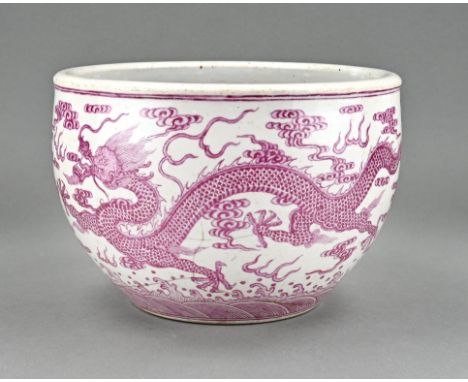 Chinese porcelain bowl with dragon decor in pink. With bottom mark. Hole in bottom mark, also old hairline cracks. Dimensions