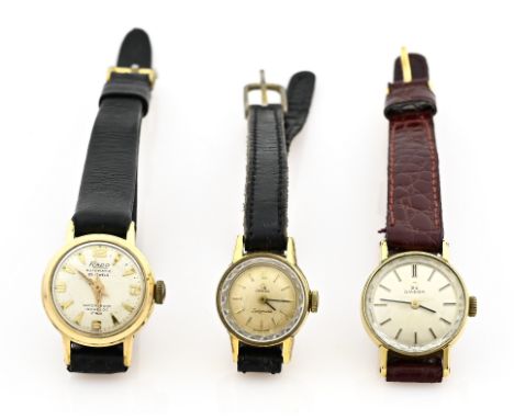 Three vintage ladies' watches with leather strap. Small watch, Omega Ladymatic with a black strap, an Omega watch, mechanical