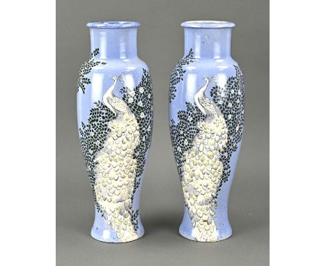 Two antique polychrome pottery Chris van der Hoef (1875 - 1933) vases with peacock decor and light-blue glaze. Signed. Amphor