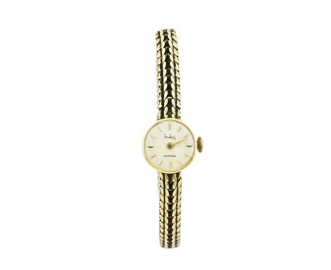 Vintage yellow gold ladies watch with gold strap, 585/000, mechanical, marked Indus. ø 15 mm. Gross weight approx. 25 grams. 