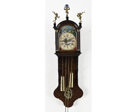 Root nuts Frisian tail clock with moon phase. Second half of the 20th century. Dimensions: 75 cm. In good condition.
