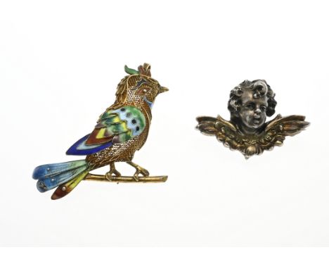 Lot with 2 silver brooches, a brooch/pendant in the shape of a bird, gold-plated and richly decorated with enamel. 52x51mm. A