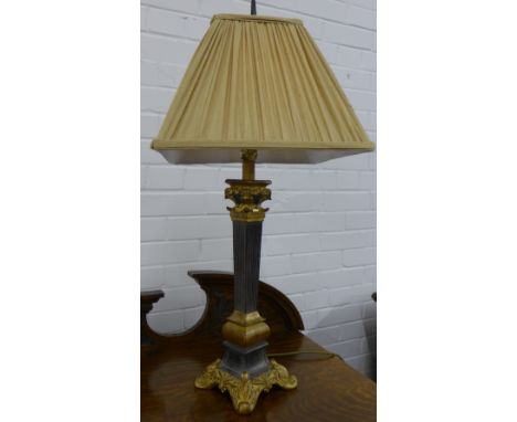 Gilt effect corinthian column table lamp, base and shade, 75cm high overall