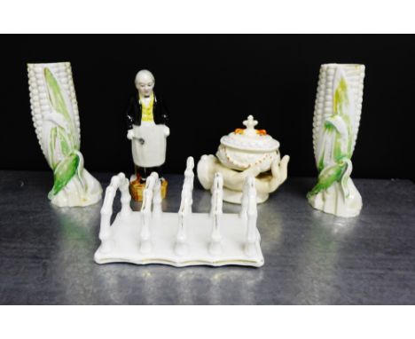 Staffordshire wares to include a pair of corn on the cob vases, a toastrack, trinket jar and a figure (5)