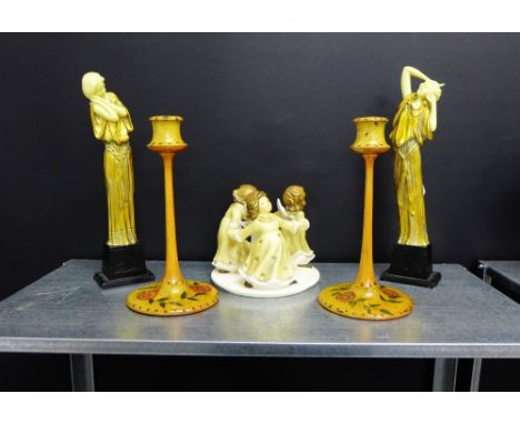 A mixed lot to include a Goebels Angels candlestick, a pair of Art Nouveau resin figures and a further pair of stained wood c