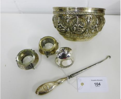 A mixed lot to include an Eastern white metal bowl embossed with figures together with a silver handled button hook, a pair o
