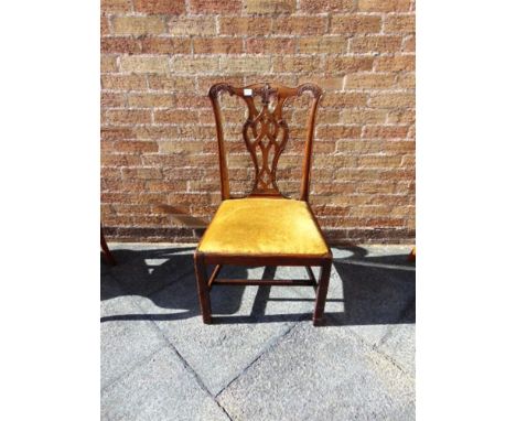 A CARVED MAHOGANY CHIPPENDALE STYLE SINGLE DINING CHAIR  with pierced vase shape splat back