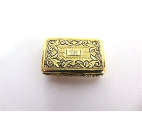 A LATE GEORGE IV SILVER GILT VINAIGRETTE by Taylor & Perry, Birmingham 1829, with engine turned and chased decoration, monogr