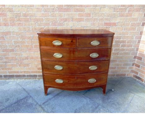 A 19TH CENTURY MAHOGANY BOWFRONT CHEST  of two short and three long drawers on splayed bracket feet, 100cm wide 48cm high 102