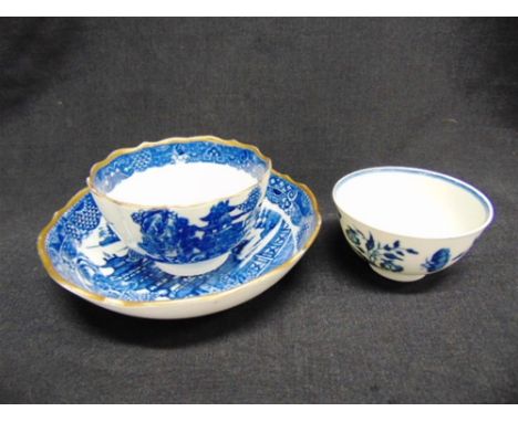 AN 18TH CENTURY WORCESTER TEA BOWL  decorated in the 'Three Flowers' pattern, crescent mark to base, 7cm diameter; together w