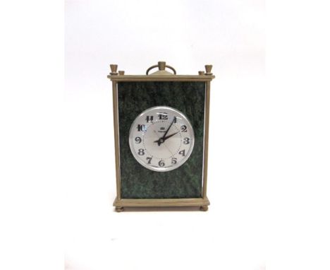 A SOVIET RUSSIAN VEGA GREEN GRANITE MANTEL CLOCK the silver coloured circular dial with black Arabic numerals, overall 17.5cm