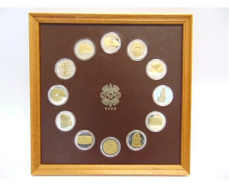 A SET OF TWELVE SILVER COINS  John Pinches London import marks 1977, issued to commemorate South American Inca & Mayan artifa