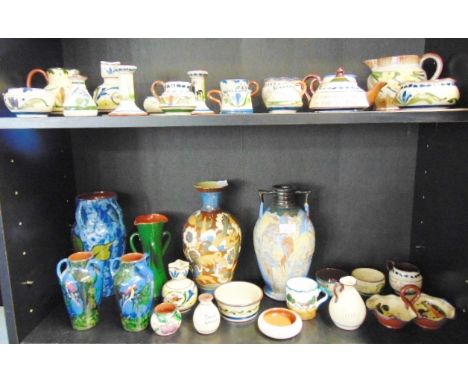 A LARGE COLLECTION OF ASSORTED DEVONWARE ITEMS,  inlcuding a large Brannam Barum ware baluster vase with sgraffito decoration