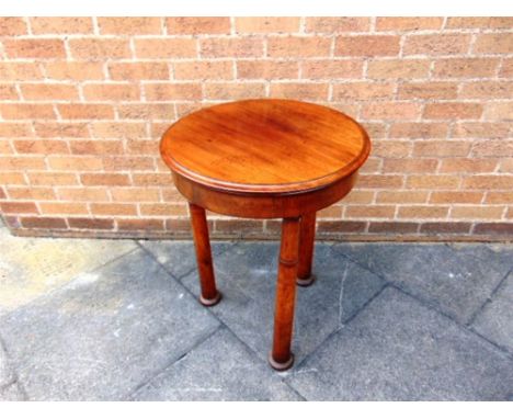 A VICTORIAN MAHOGANY WASHSTAND,  the hinged top opening to circular basin (lacking liner), on three rurned supports (adapted,