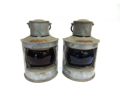 A PAIR OF SHIP'S NAVIGATION LIGHTS of galvanized metal, the first with a convex red glass lens and an applied label 'Port'; t