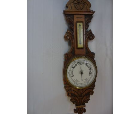 Antique carved barometer