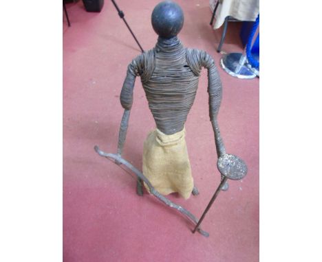 African modern art figure of a man carrying a hunting bow