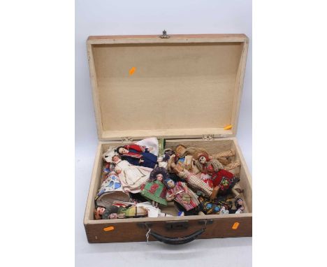 A collection of various vintage peg dolls with orginal continental dress