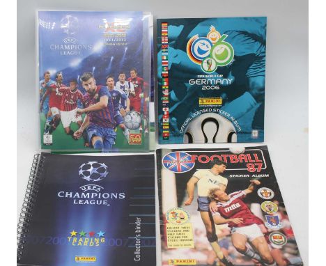 A collection of vintage Panini Football sticker albums and contentsGermany has 50% and the USA is complete.