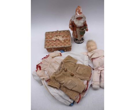 A vintage cloth doll and various dolls clothing 
