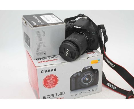 A Canon EOS 750D digital camera, boxed, with travel caseIn working condition, includes three batteries, one extra lens, with 