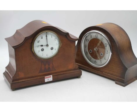 An Edwardian mahogany cased eight day mantel clock, the enamel dial showing Arabic numerals, height 24cm, together with an ea