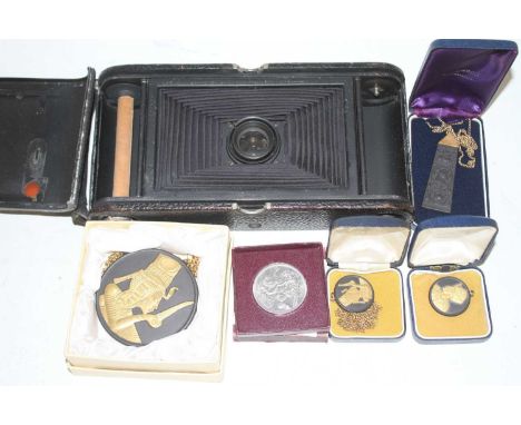Miscellaneous items, to include a vintage camera, Festival of Britain crown, Wedgwood black basalt pendant etc 