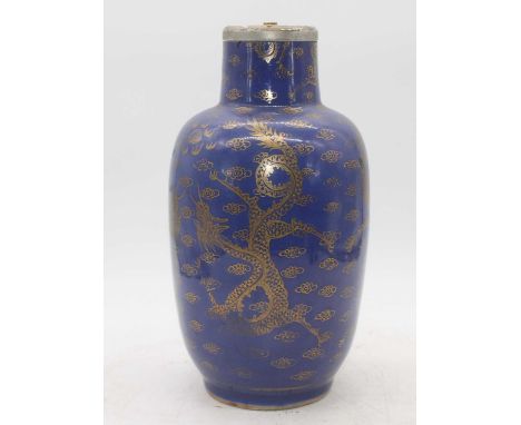 A Chinese blue glazed stoneware vase, gilt decorated with four clawed dragons, later converted into a table lamp, height 32cm