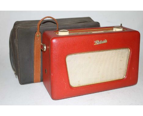 A vintage Robert Model R500 radio, in travel case 