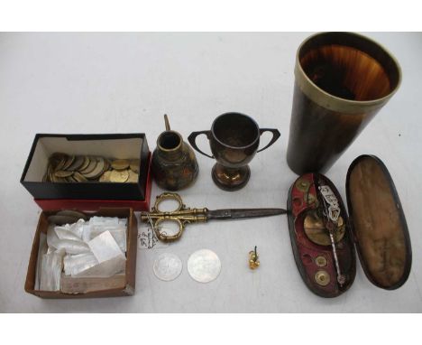 A collection of miscellaneous items to include various gaming tokens, small silver trophy cup, set of 19th century pawnbroker