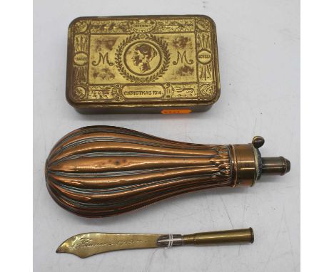 A 19th century copper and brass powder flask, 19cm; together with a Christmas 1914 brass tin; and a brass paperknife made fro