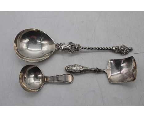 A late Victorian silver anointing spoon having a typical shallow bowl on spirally turned stem with figural terminal, maker Wi