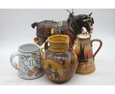 A Melba type pottery horse, height 28cm, together with a Passmore jug, a Watcombe coffee pot and a Werner cider flask (4)