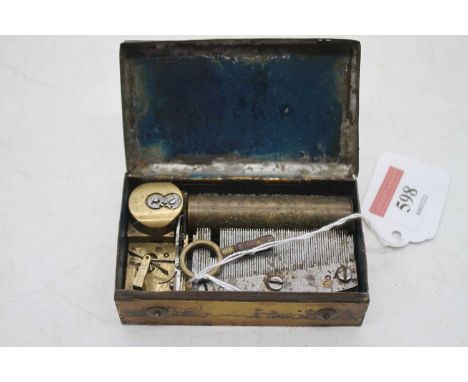 A 19th century continental music box of rectangular form, the hinged lid decorated with a mountain lake scene, opening to rev