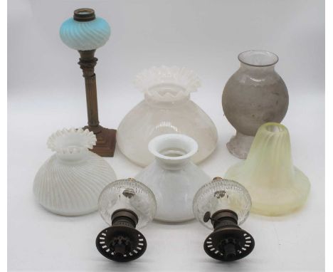 A collection of Victorian and later oil lamp parts