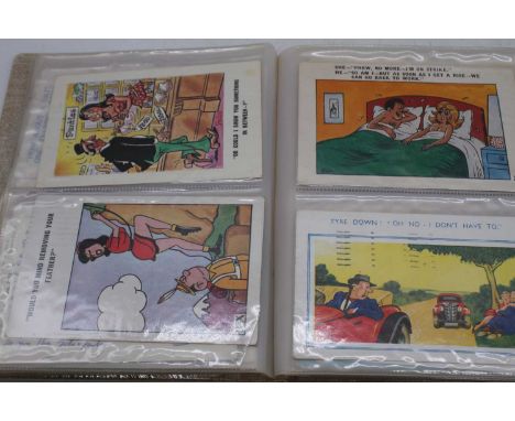 A collection of vintage postcards, mainly humorous