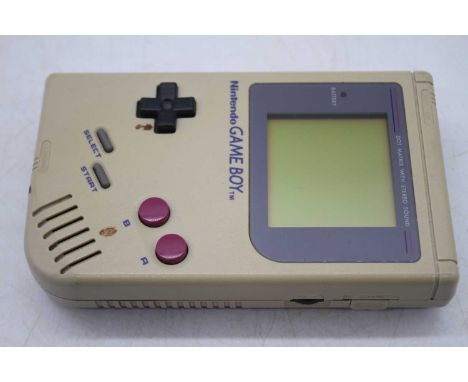 A Nintendo GameBoy, with Mario Land cartridge game 