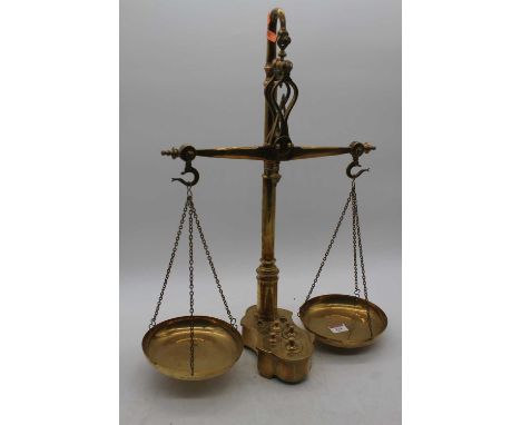 A set of 19th century brass scales and weights, height 56cm