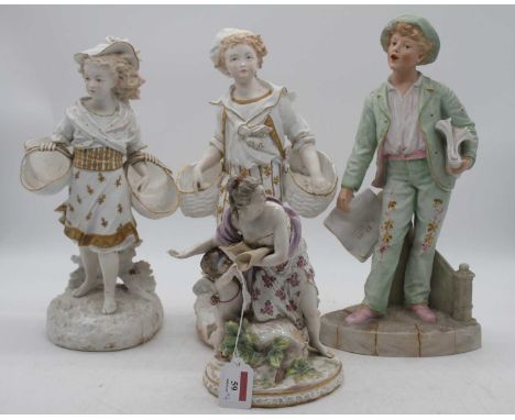 A German porcelain figure of a mother and child, height 23cm; together with three bisque porcelain figures of children