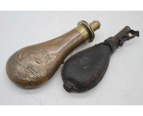 A 19th century brass and copper powder flask, 19cm; together with another 